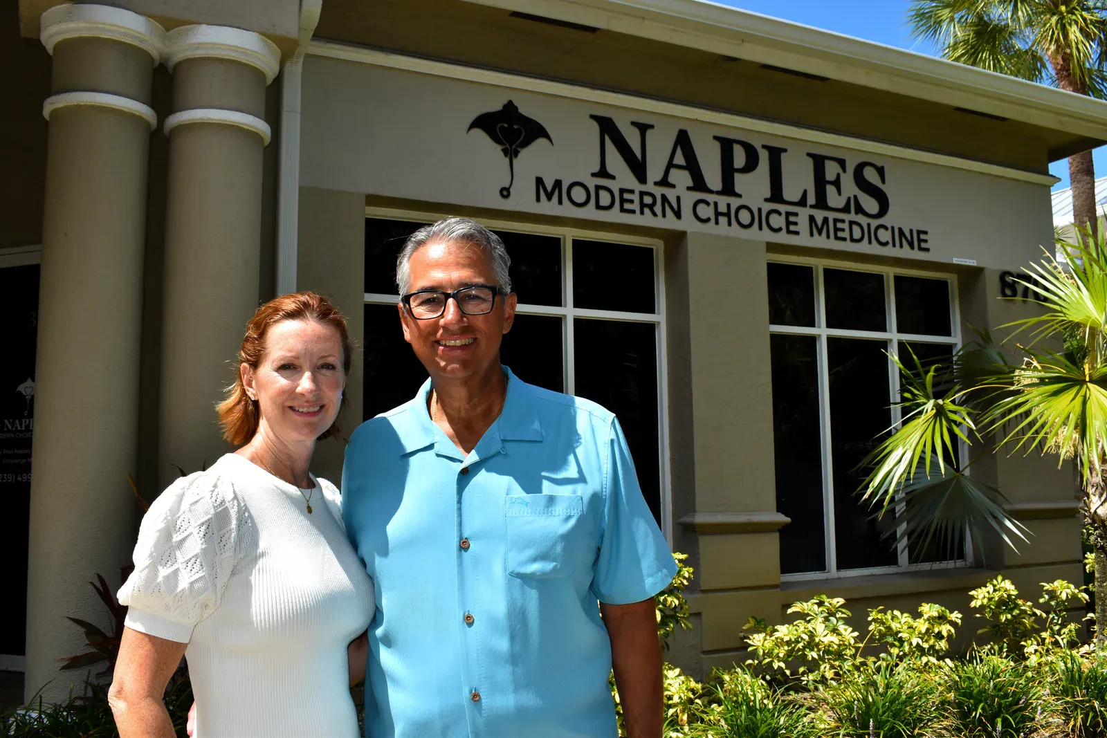 Dr. Sandy Naples and a woman outside the Naples Modern Choice Medicine office